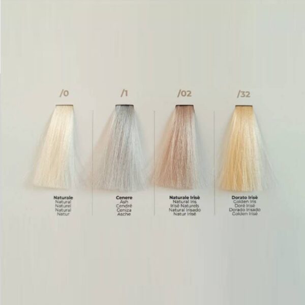 Four hair color swatches on a pale panel labeled /0, /1, /02, /32 with the names Natural, Cenere, Naturale Irisé, and Dorato Irisé.