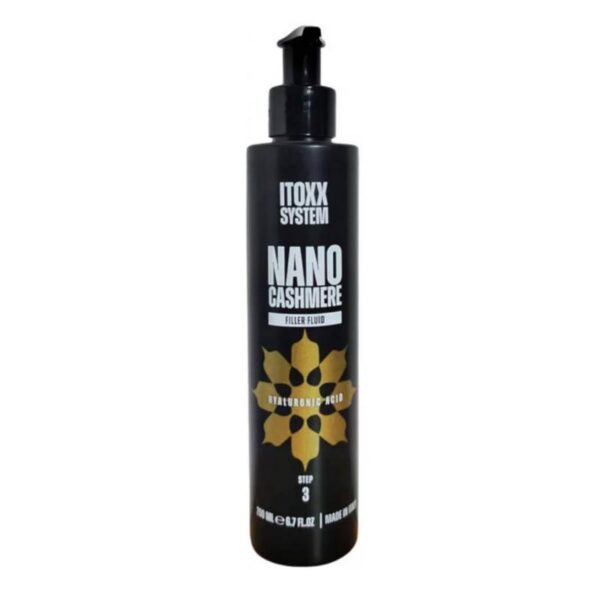 Black pump bottle labeled ITOXX SYSTEM Nano Cashmere Filler Fluid with a gold geometric flower logo on a white background used for hair treatment products